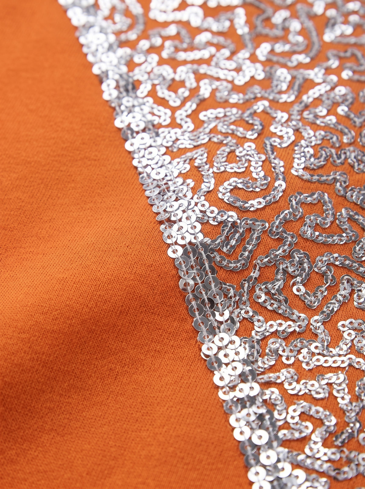 Color-Block Orange Jumper with Glam Sequin Sleeve
